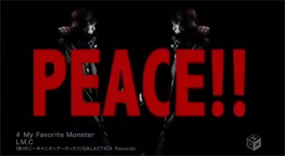 "PEACE" in large red letters while mirror images of Aiji play guitar.