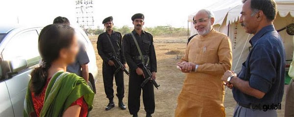 Website releases photos of Modi with woman, New Delhi, Gujarat, Police, Raid, District Collector, 
