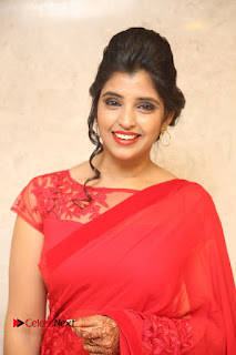 Actress Shyamala Stills in Red Saree at Okkadochadu Movie Audio Launch  0334