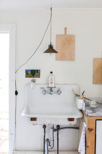 Minimal and soulful farmhouse style interior with country sink and slow living vibe - found on Hello Lovely Studio