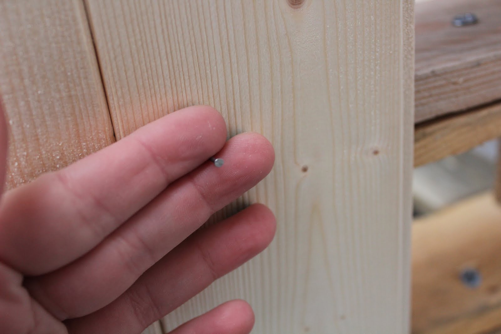 how to hold tiny nails