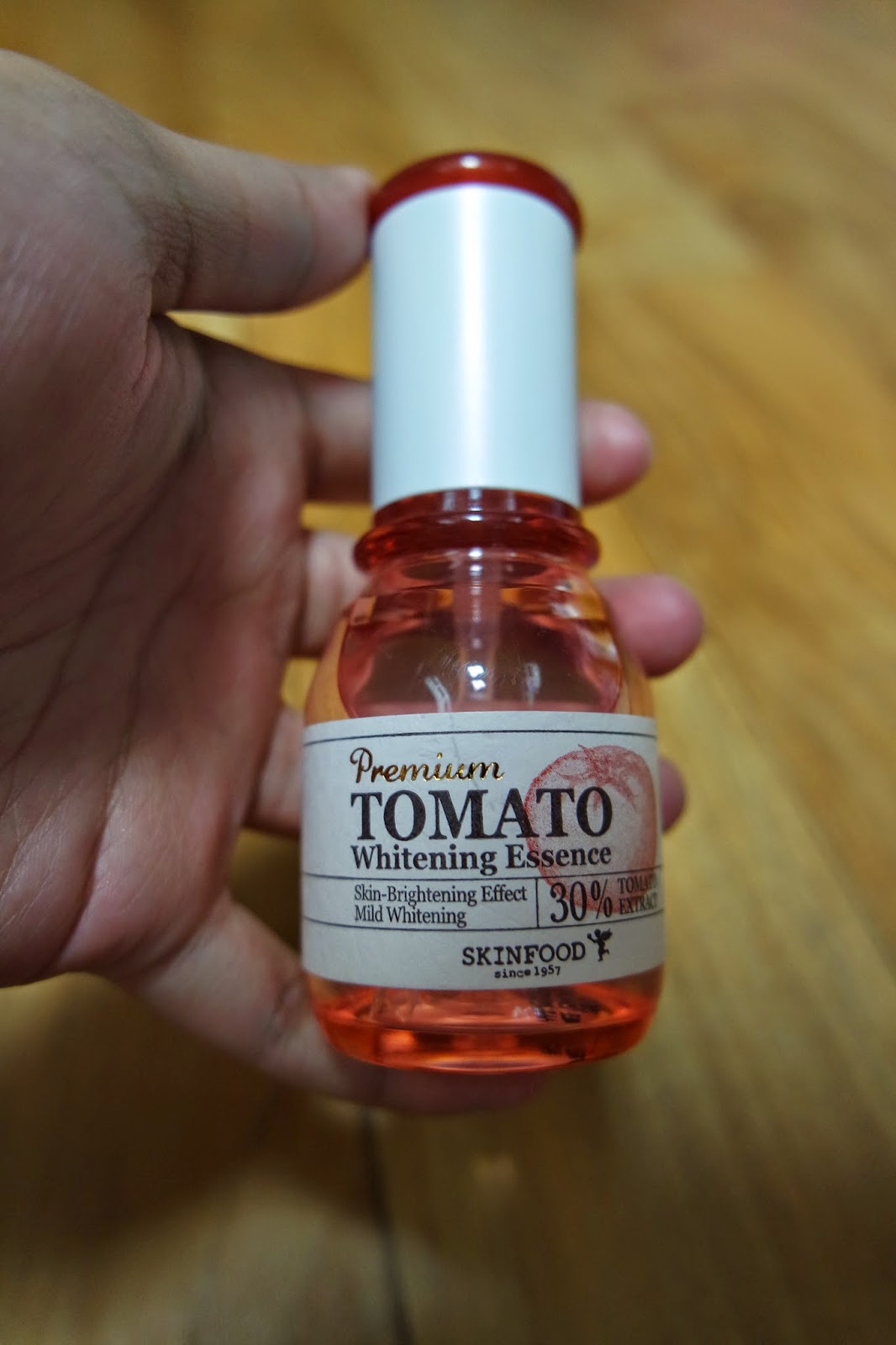 skinfood premium tomato whitening essence