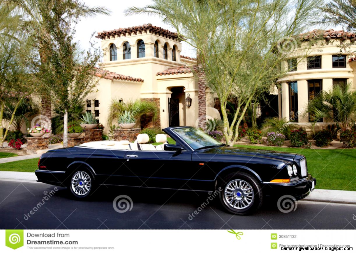 House with Cars Parked in Front