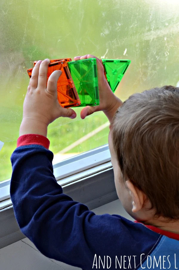 Building 3D shapes on windows using Magna-Tiles from And Next Comes L