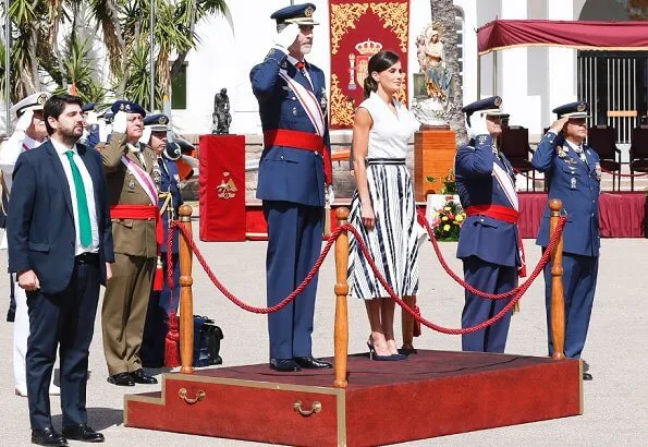 Queen Letizia wore Balenciaga Striped pleated crepe skirt and Carolina Herrera high heel slingback blue pumps