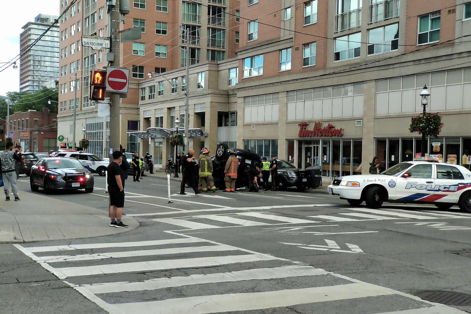 Car rolls over at Queen and Richmond st in Toronto PhotoDorks