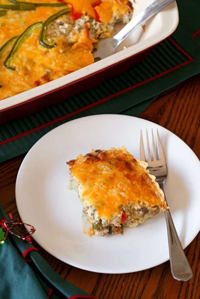 Holiday Hash Brown Casserole is a cheesy potato breakfast casserole that is loaded with fresh veggies and turkey sausage, making it truly holiday-worthy! #sponsored