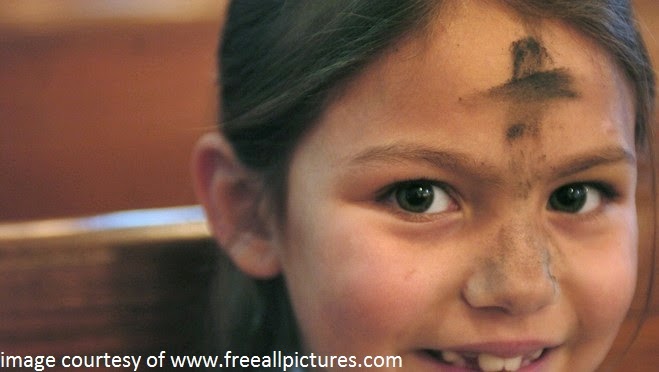 imposition of ashes ash wednesday forehead chld imposition of ashes ash wednesday forehead chld