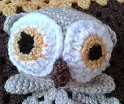 http://www.ravelry.com/patterns/library/hooty-the-owl-lovey---comforter