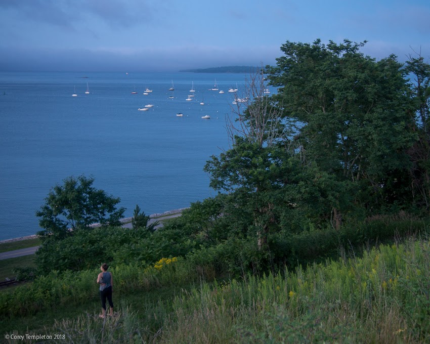 Portland, Maine USA July 2018 photo by Corey Templeton. Stopping to take in the twilight view of Casco Bay from the Eastern Promenade.