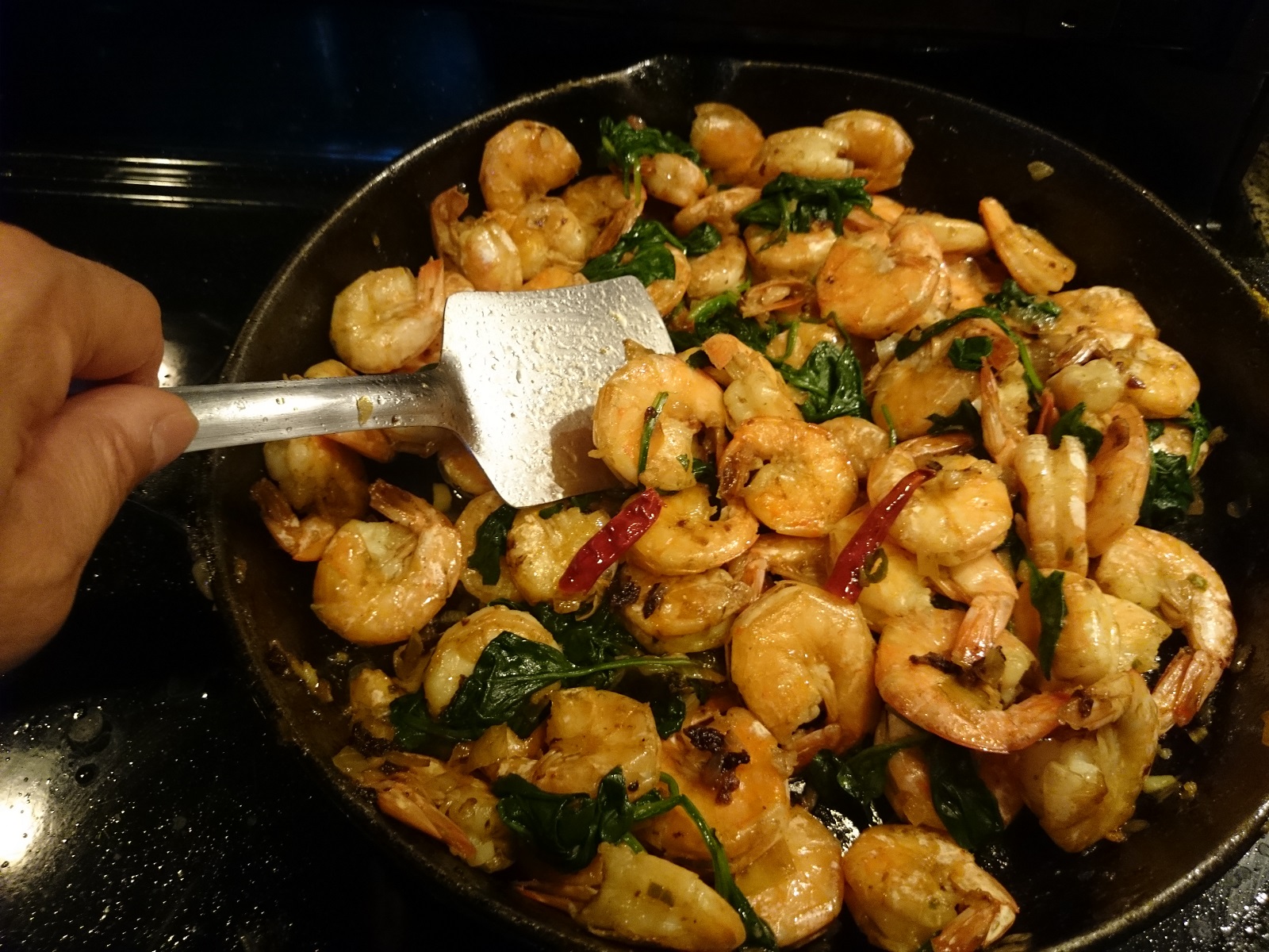 John Koshy Stirfrying Shrimp and Spinach