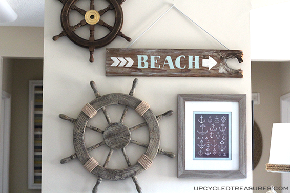 DIY beach sign and ship's helm in this inspiring beach themed wall gallery - by Upcycled Treasures, featured on I Love That Junk