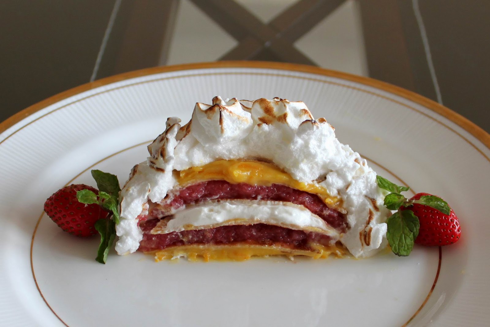 Say cheese: Alaska Crepe Stack with Orange Curd and Strawberry Jelly