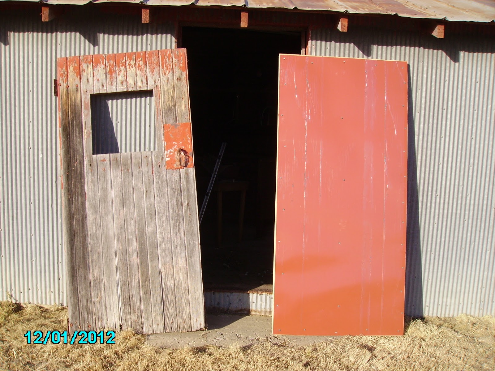 ... left-over wood and metal, we decided to make a new walk-in door, too