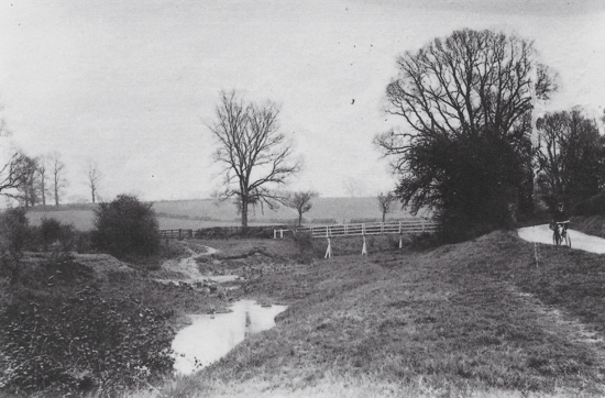 Photograph of High Bridge, Warrengate Road before the waterworks were builtThe postman on his bike is Alf Marsden c 1910-15