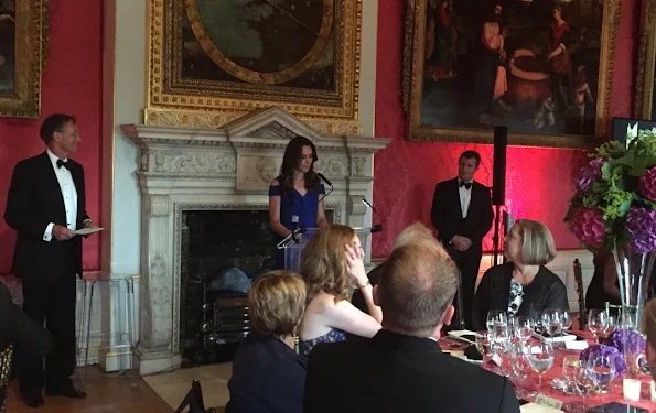 Kate Middleton attended the TeamSportsAid 40th anniversary dinner at Kensington Palace. Kate Middleton wore Roland Mouret Nansen Crepe Dress, PRADA Clutch