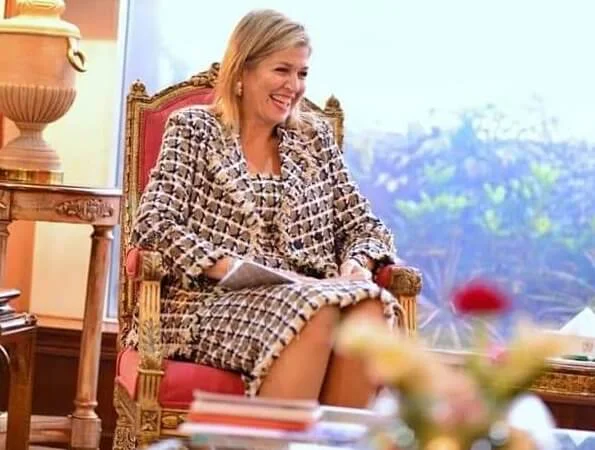 Queen Maxima wore a cotton and wool blend tweed dress and jacket by Oscar de la Renta. Prime Minister Imran Khan