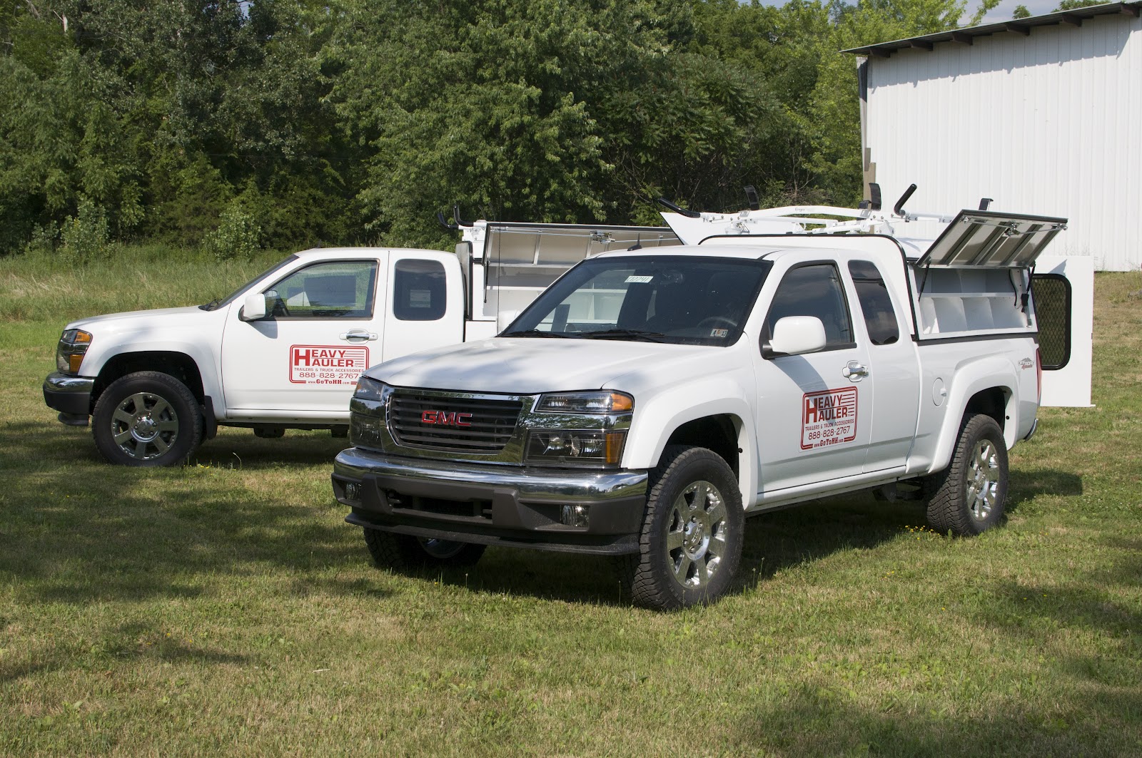 Two 2012 GMC Canyon Pickup Trucks With New ARE DCU Truck Caps Roof
