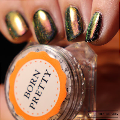 Swatch of Born Pretty Store peacock holographic nail powder item #40683 over black nail polish