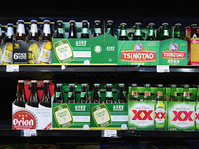 selection of six-packs of beer including Taiwan Beer and Tsingtao