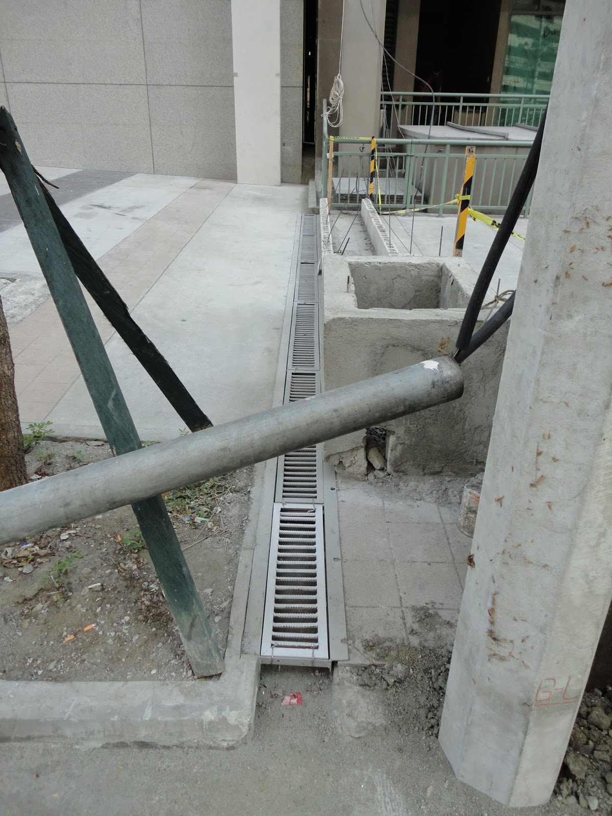 Soho Central Condominium: NEWSFLASH: Gutter with metal grill cover ...