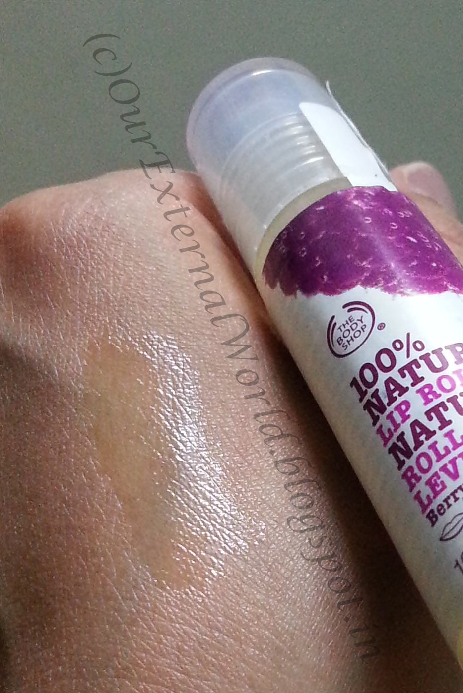 The Body Shop 100 Natural RollOn Lip Balm Berry