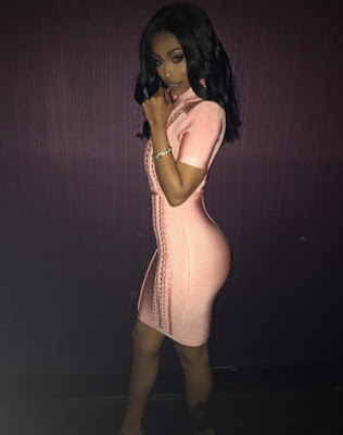 Selamawit Shiferaw in pink dress showing curvy body