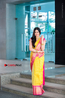 Actress Adah Sharma Exclusive Poshoot in Beautiful Yellow Silk Saree at Saree Niketan Showroom Launch  0008