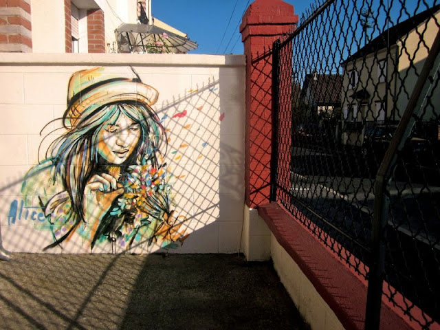 Рисунки на стенах. Alice Pasquini 8