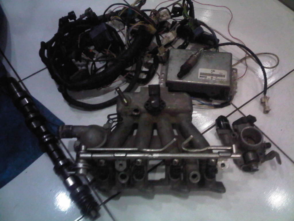 I believe that he's failed the conversion because he's still maintained the use of Carry ECU. In my opinion, as we couldn't use the Carry intake manifold ...