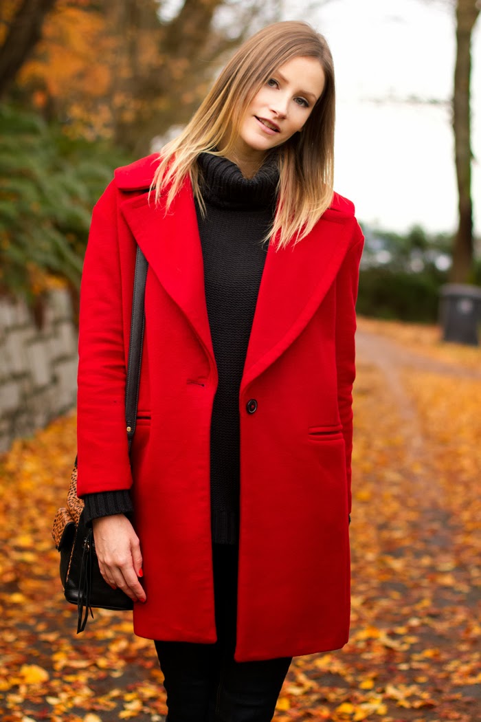 Vancouver Fashion Blogger, Alison Hutchinson, is wearing a red zara coat, black H&M turtleneck, dark blue Rag & Bone jeans, black high hell zara booties, and a recbecca minkoff loepard print bucket bag