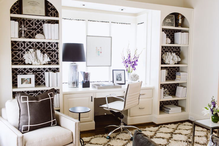Give your bookcases/shelves a high end look by lining them with black wallpaper! It really helps accessories pop. via monicawantsit.com