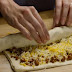 She Rolls Ground Beef And Cheese Into A Pizza Dough. What She Ends Up Making? DELICIOUS!