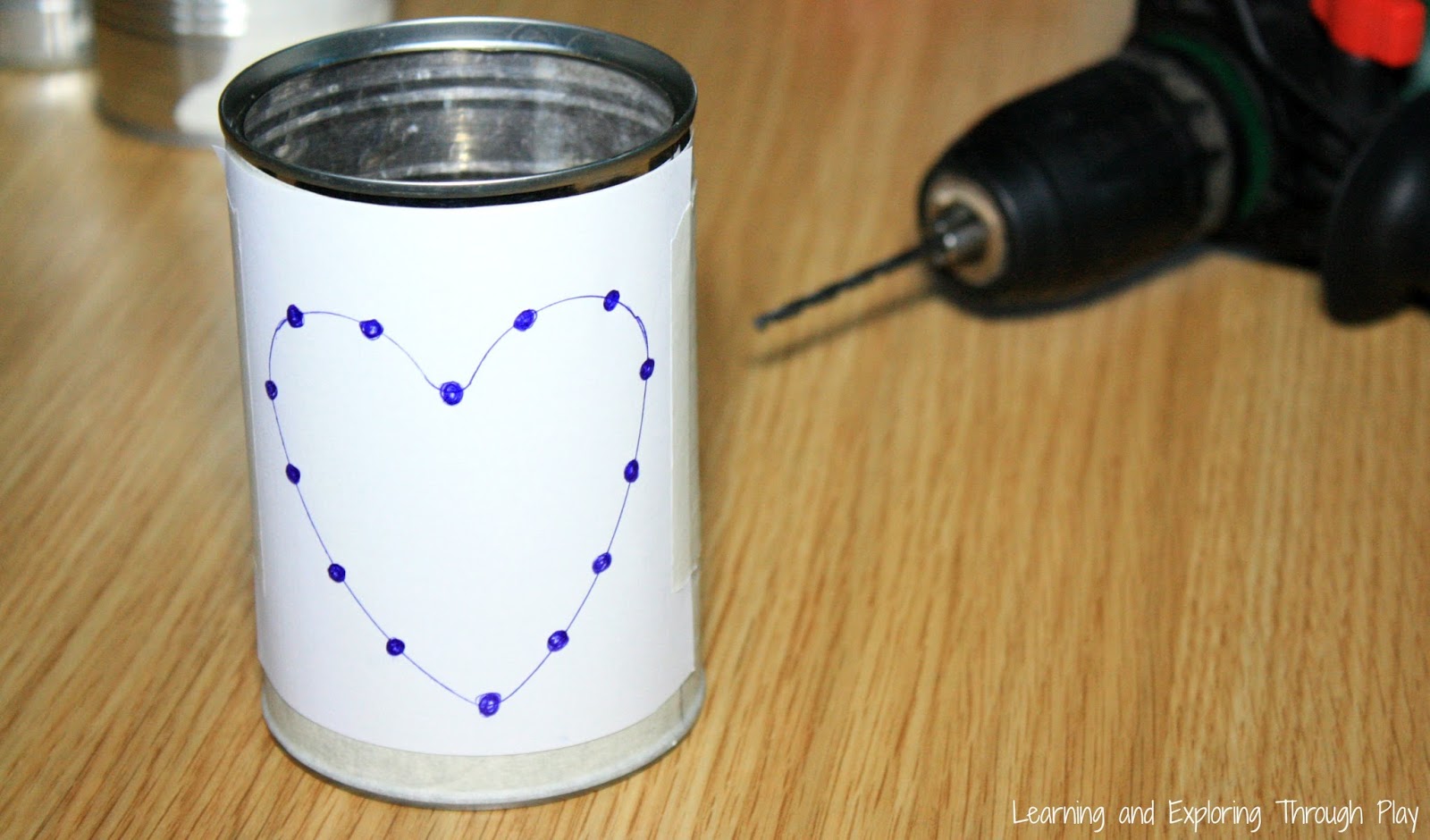 Learning and Exploring Through Play Tin Can Heart Lanterns