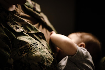 Military mom nursing while in Uniform United States Navy - Morning Owl Fine Art Photography San Diego