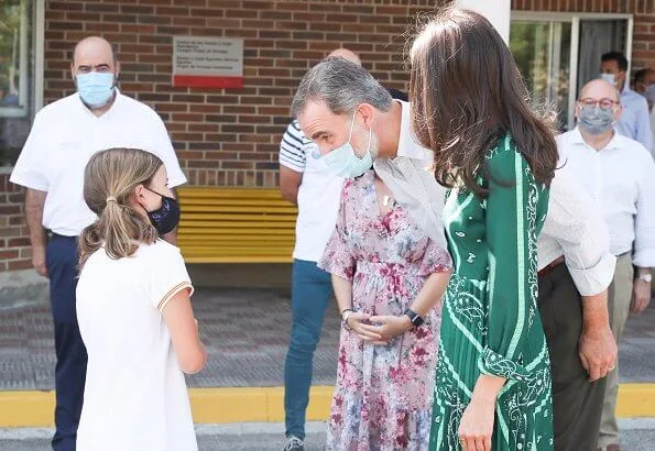 Queen Letizia wore a scarf print long dress from Sandro, and espadrille wedges from Macarena. Queen Letizia wore Sandro long dress