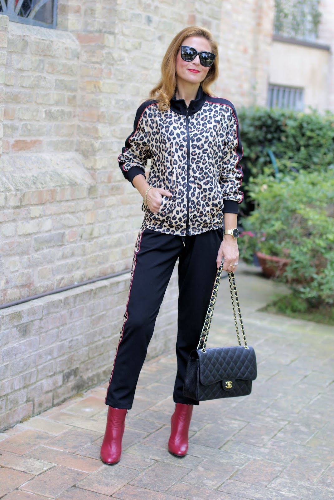 The animal print trend: leopard print tracksuit and Le Silla ankle boots on Fashion and Cookies fashion blog, fashion blogger style