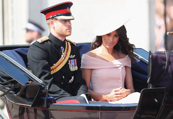 Meghan Markle, The Duchess of Sussex is wearing a dress by Carolina Herrera. The Duchess of Cambridge is wearing a dress by Alexander McQueen. wessex