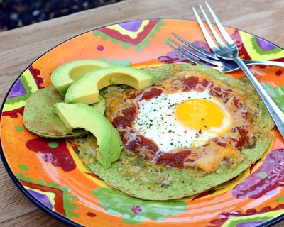 Mexican Gashouse Eggs ♥ KitchenParade.com, a takeoff on the classic Gashouse Eggs, just an egg fried in the center of a tortilla, with salsa and cheese.