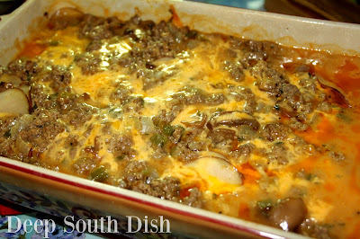 Meat and Potatoes Casserole, a baked dish, layered with potatoes, seasoned ground beef, cream soup sauce and topped with shredded cheese.