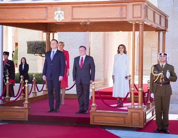 Queen Rania meets,  First Lady Agata Kornhauser style wore gianvito rossi shoes, Prada dress, diamond earrings, J.Crew closet