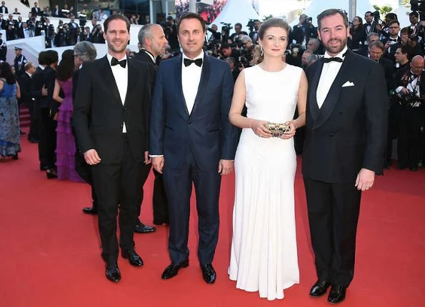 Princess Stephanie wore a white dress by Ralph Lauren at the opening night of Cannes Film Festival. The same dress had been worn by Crown Princess Victoria at Polar Music Prize ceremony in 2016