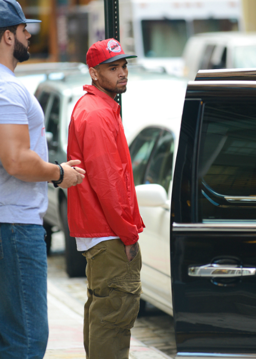 Candids: Chris Brown and his girlfriend Karrueche Tran 8/11