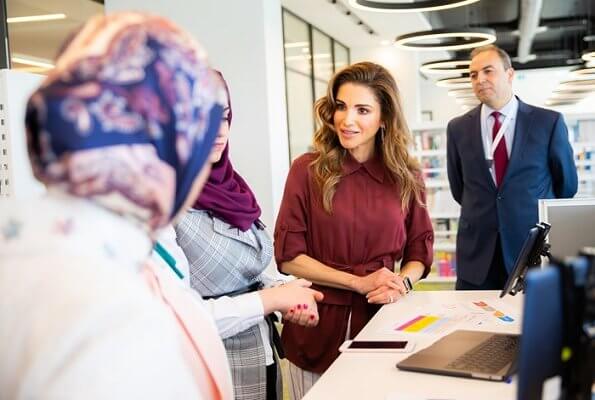 Queen Rania wore Joseph Lin Rayon stripe trousers in ruby. Sheinside burgundy long sleeve asymmetrical belted shirt and blouse