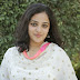 Nithya Menon Smiling Face Closeup In White Dress