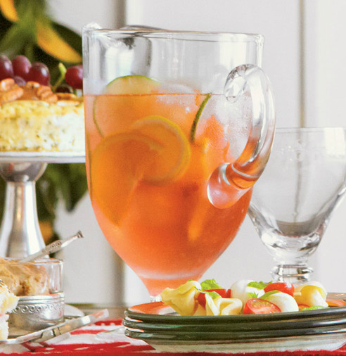 White wine sangria with peaches, limes, oranges and lemons - perfect for summer!