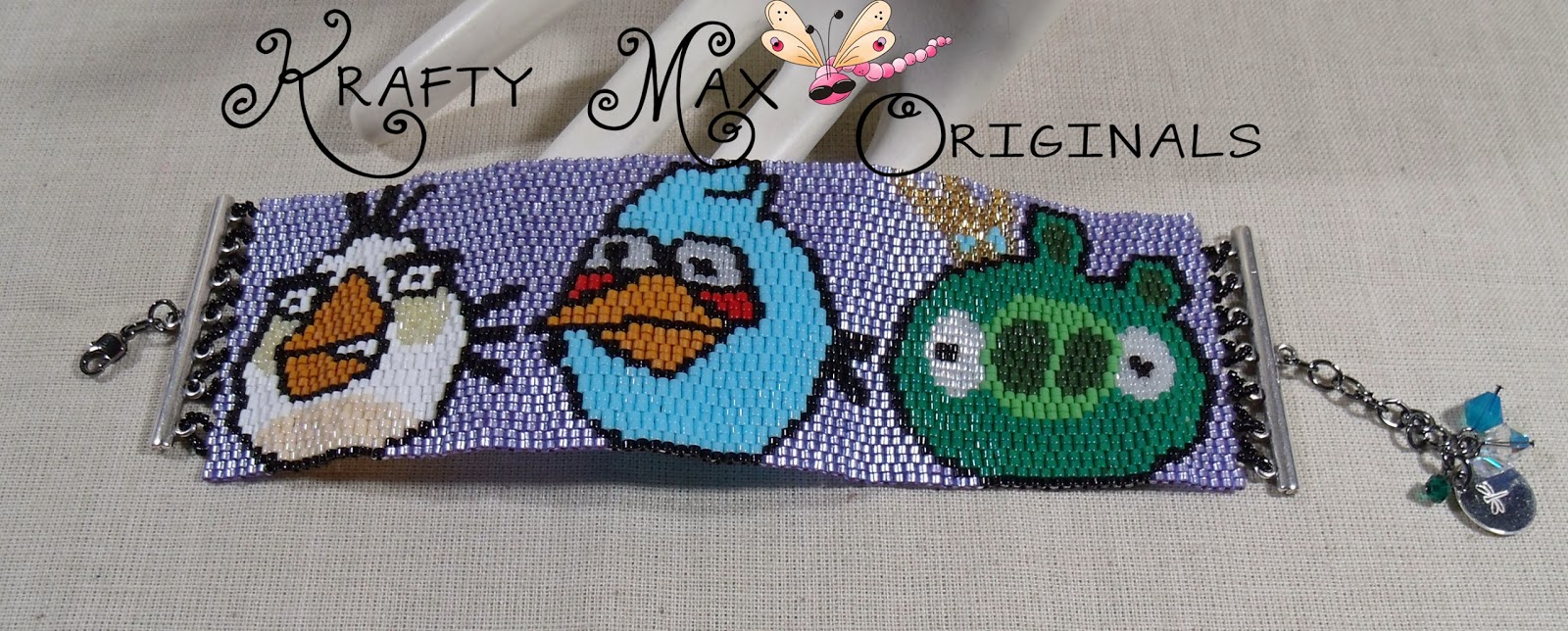 http://www.artfire.com/ext/shop/product_view/KraftyMax/8001727/angry_birds_-_green_pig_blue_bird_and_white_bird_beadwoven_bracelet_/handmade/jewelry/bracelets/beadwork