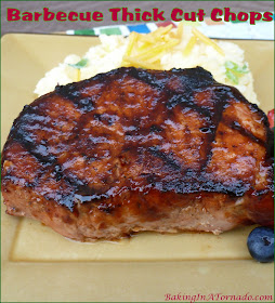 Barbecue Thick Cut Chops, rubbed, marinated and grilled these thick pork chops have big bold flavor. | Recipe developed by www.BakingInATornado.com | #cook #dinner