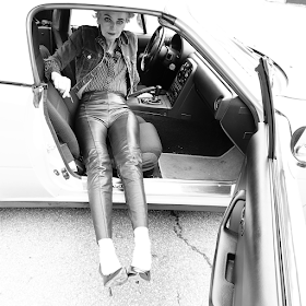 Mel Kobayashi of Bag and a Beret, tight leather pants and heels and a sports car