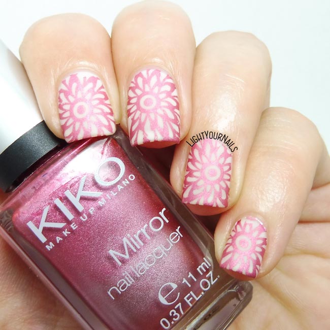 Pink mandala stamping nail art